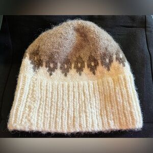 Cowichan pattern wool toque in traditional colours of off-white and browns